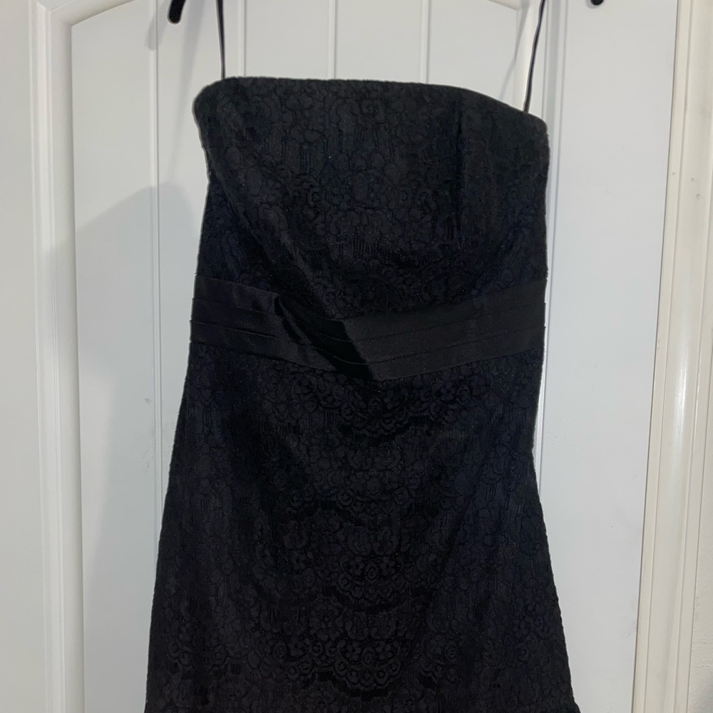 Black strapless dress.
